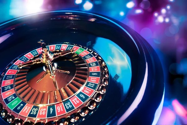 Mobile phone displaying live Habanero blackjack table with bet controls and dealer video
